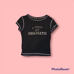 A little bit dramatic black shirt. It is in good condition and barley worn.